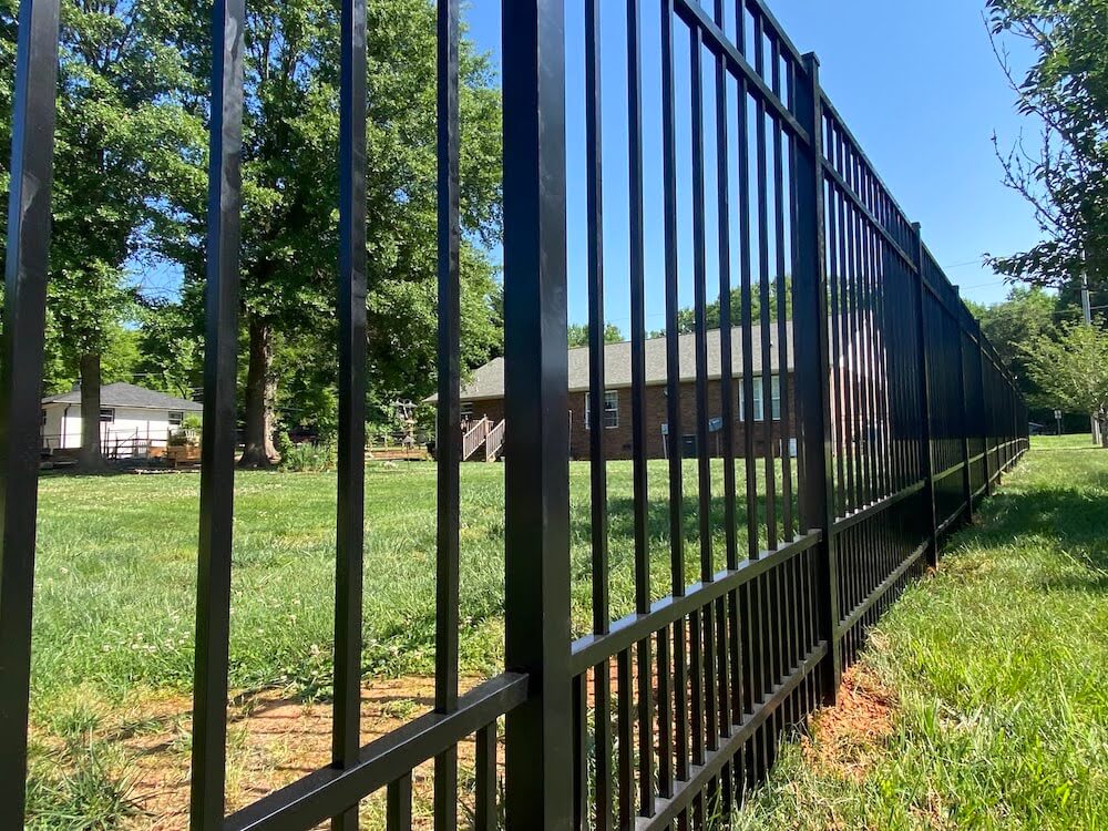 Black aluminum puppy picket fence - Black label fence near Charlotte NC.