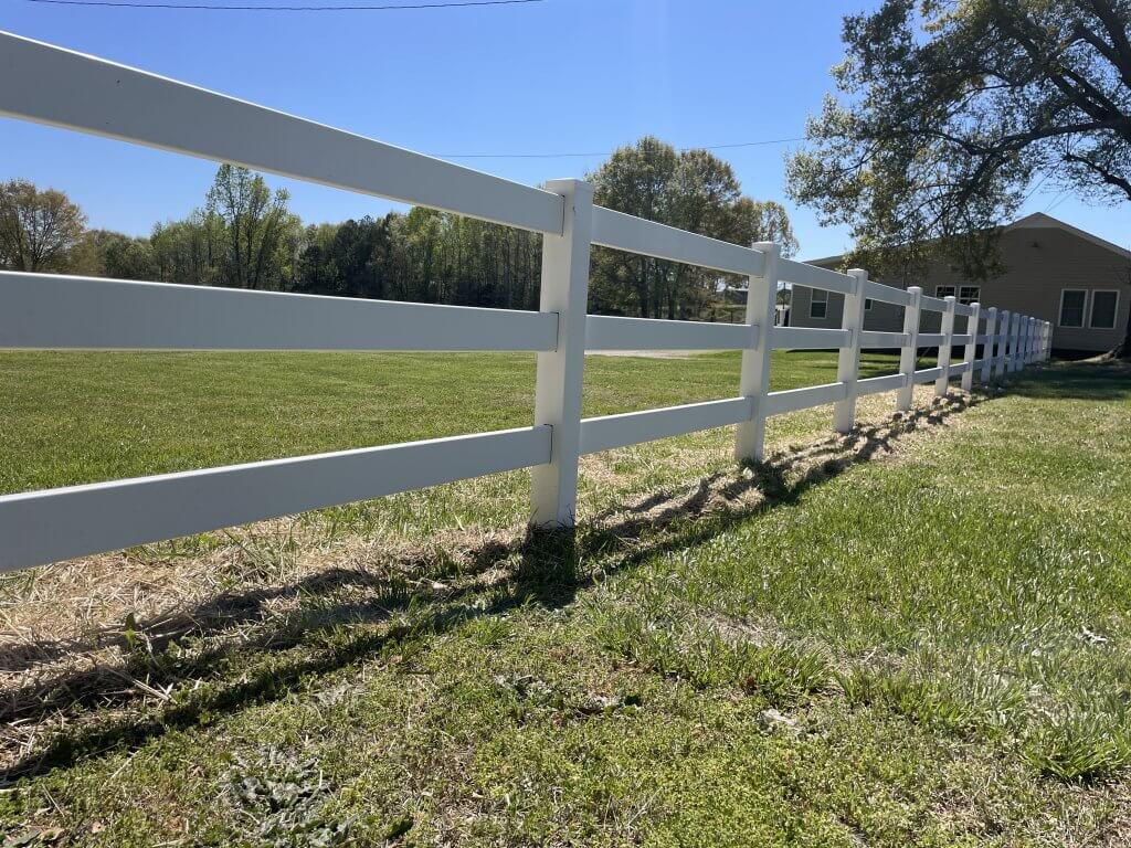 3 Board White Vinyl Fence Installation.