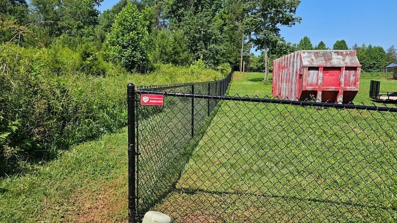 This is a 4' high Black Chain Link Fence