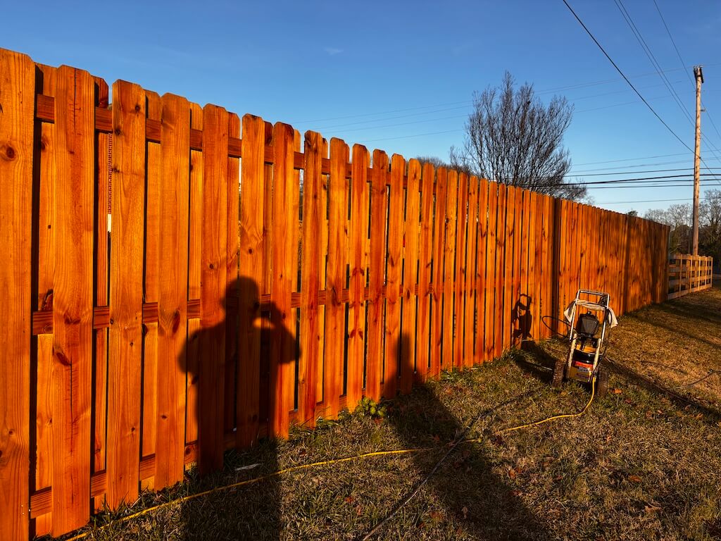 stained wood fence by Black Label Fence