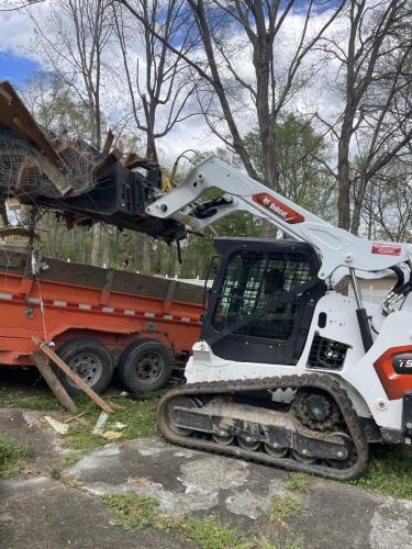 Bobcat loading a demolition in Fort Mill SC