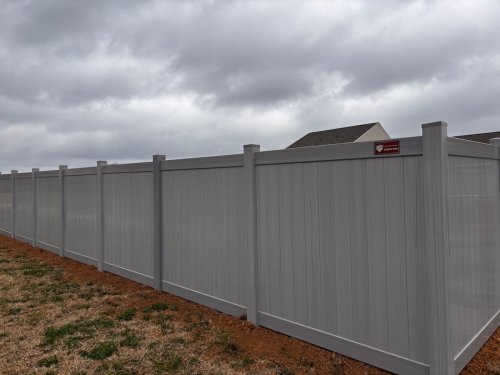 Gray vinyl fence