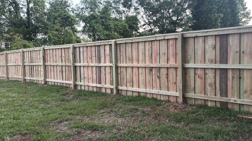 Custom board on board fence installation