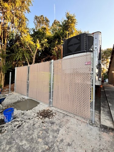8' high chain link tan privacy slats on gates- Golden corral Asheboro
